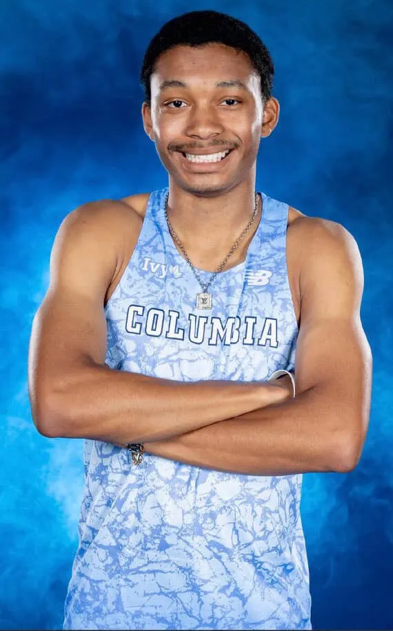 Christian Wilbon formal uniform Columbia tracking studio portrait layout blue background